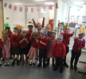 Nursery pupils are pictured wearing hats and crowns they have created in celebration of the Queen's Platinum Jubilee.